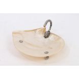 Chinese mother of pearl and white metal mounted dish with arching naturalistic handle,