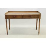 19th century mahogany washstand with three-quarter gallery, two drawers, on turned legs,