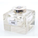 George V silver mounted cut glass inkwell of square form,