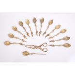 Fine and rare set of twelve mid-18th century silver gilt teaspoons with matching sugar nips and