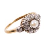 Victorian pearl and diamond cluster ring with a flower-head cluster centred with a pearl surrounded