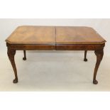 Good quality Queen Anne revival walnut crossbanded and featherbanded extending dining table with