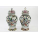 Pair Chinese famille rose palette porcelain baluster-shape vases and covers,