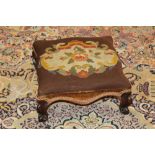 19th century rosewood footstool of shaped square form, with tapestry embroidered seat,