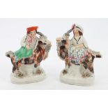 Pair Victorian Staffordshire figures of children riding goats, circa 1860,