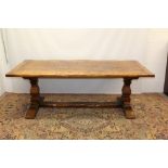 17th century-style oak refectory table, the plank top with crested ends,