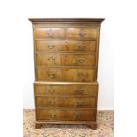 George III mahogany chest on chest with dentil cornice and geometric-inlaid frieze,