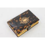 Victorian tortoiseshell bound prayer book with inset gilt metal vacant cartouche,