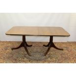 George III-style mahogany twin pedestal dining table,