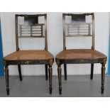 Pair of Regency black lacquered and gilt heightened side chairs,