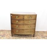 Regency mahogany bow front chest of drawers, having two short over three long graduated drawers,