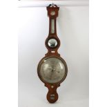 Regency inlaid mahogany banjo-shaped barometer thermometer of bold proportions,