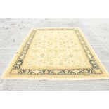 Fine large Afghan-style hand-woven carpet with gold meandering lotus flower field within meander