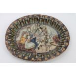 Antique relief moulded dish with Whieldon-type pearlware glaze depicting historical figures,