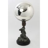 Unusual antique pewter and bronze centrepiece surmounted by large silvered glass witch ball,