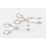 Good quality Georgian cast silver sugar nips with rustic design and leaf foliage and leaf-shape