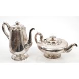 William IV silver teapot of compressed form, with wavy borders, engraved armorial crest,