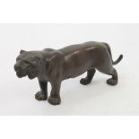 Japanese Meiji bronze figure of a tiger modelled in standing pose,