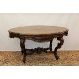 19th century Continental rosewood centre table of cartouche shaped outline on double D-scroll
