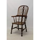 19th century yew, ash and elm Windsor chair, with high spindle back and heart-pierced central splat,