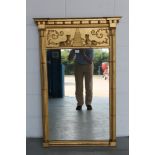 Regency gilt gesso pier mirror with rectangular plate below Egyptian theme relief frieze of central