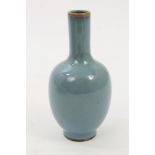 Chinese pale blue glazed bottle vase of small proportions,