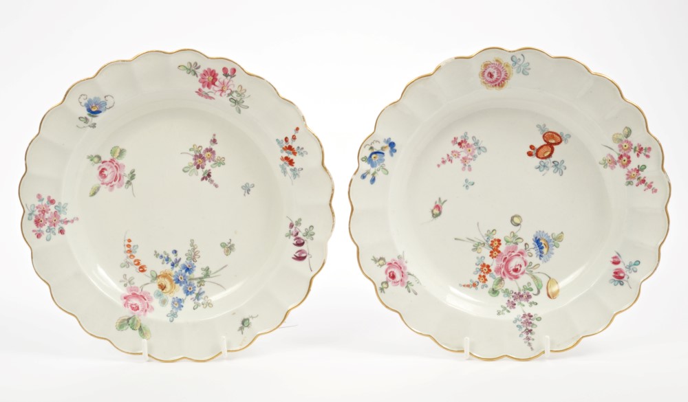 Pair 18th century Worcester Giles polychrome painted plates decorated with floral sprigs and sprays