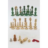 Part set of 19th century Indian carved and green stained ivory chess pieces (25 in total),