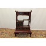 Early 20th century Chinese red and black lacquered display cabinet with gallery top and an