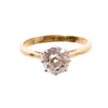 Diamond single stone ring with a cushion-shape old cut diamond estimated to weigh approximately 1.