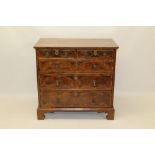 Good early 18th century walnut and boxwood line-inlaid chest of drawers,