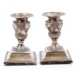Pair Victorian silver dwarf candlesticks with neoclassical revival decoration,
