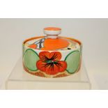 Clarice Cliff Nasturtium pattern preserve pot and cover of shallow form, printed marks to base, 7.