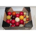 Collection of 19th century stained ivory billiard and bagatelle balls - approximately 1,