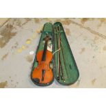 Old full-size violin, together with three bows,