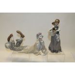 Two Lladro porcelain figures - Girl carrying three dogs in basket and Clown