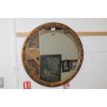 1930s circular Barbola mirror with fruit decoration,