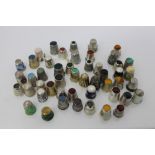 Collection of antique silver and white metal thimbles with enamel and hardstone ornament