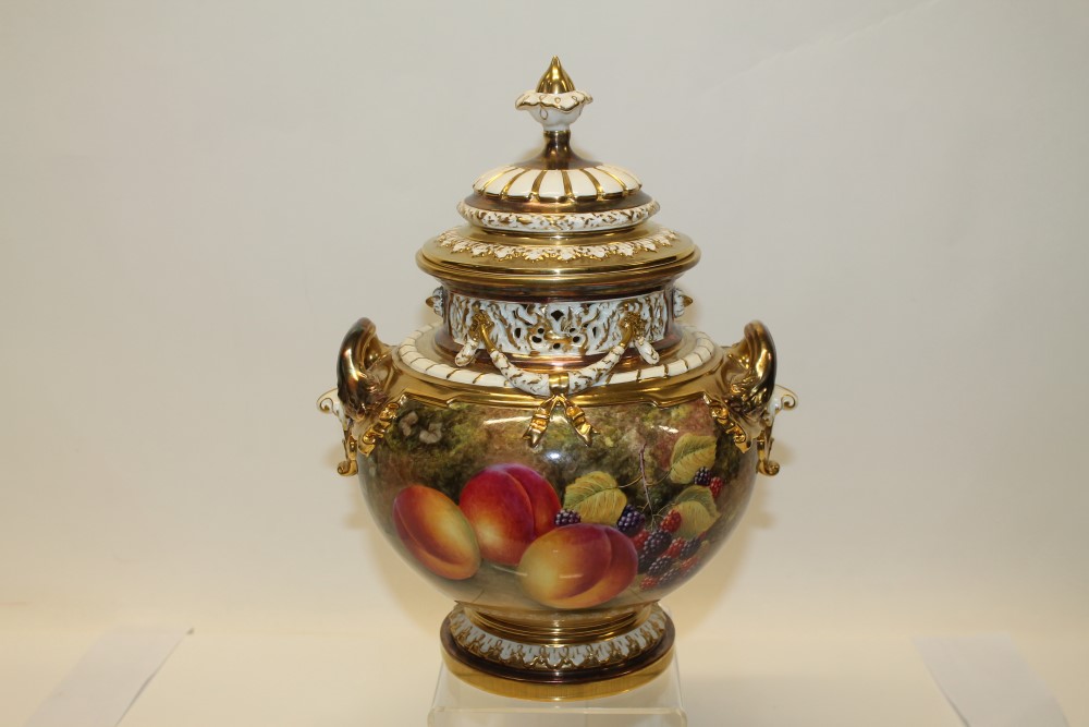 Good quality Royal Worcester ovoid two-handled pot pourri vase and cover, painted by Nigel Creed,