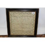 George III needlework sampler with extensive verse, within a strawberry border,