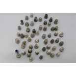 Collection of antique silver and white metal thimbles - to include novelty examples and others