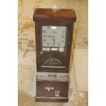 The National Time Recording Company, an early 20th century time recording clock with square dial,