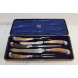 Good quality Harrods silver mounted five piece carving set with antler handles and scroll silver