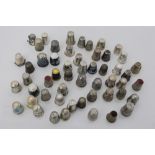 Collection of antique silver and white metal thimbles - to include enamelled examples and others