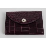 Modern purple leather key wallet by Asprey, textured to simulate alligator skin,