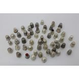 Collection of antique silver and white metal thimbles - various designs (approximately 50)