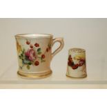 Royal Worcester blush ivory miniature cup with gilded and hand-painted floral decoration,