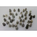 Collection of novelty antique silver and white metal thimbles - each with pictorial ornament