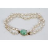 Cultured pearl double-strand bracelet with green jade and gold (14k) clasp