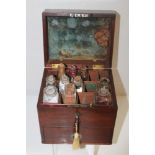 19th century mahogany apothecary cabinet with gilt brass swan-neck handle to lid,